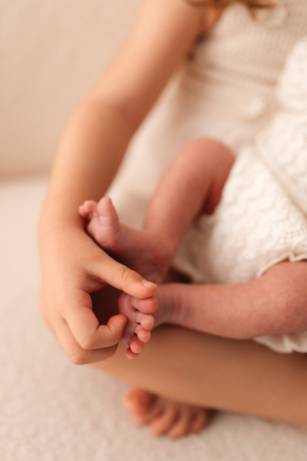 Mãe com o bebé ao colo